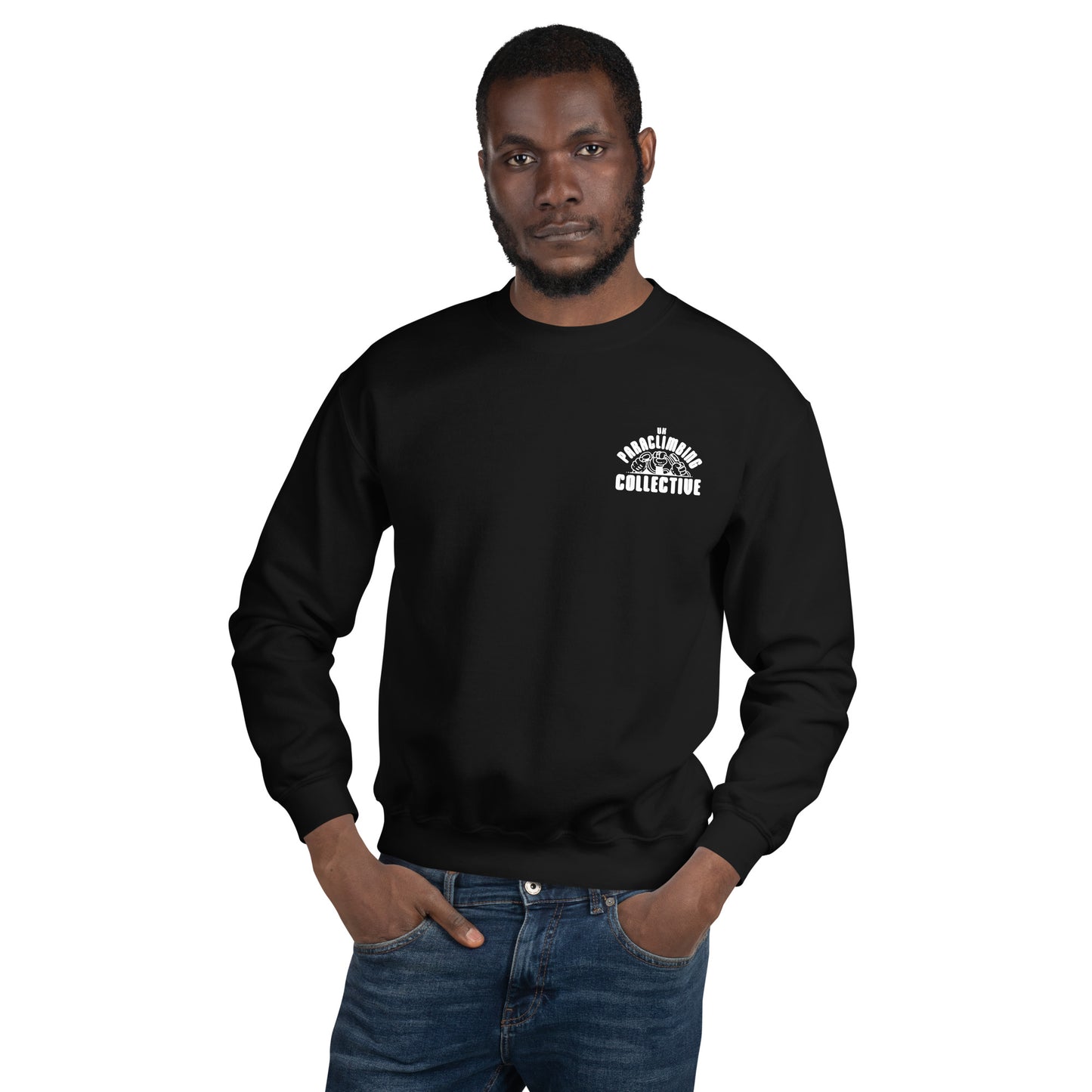 A black sweatshirt with the white UK Paraclimbing Collective logo on the left breast. The logo is "UK paraclimbing collective" with hands holding climbing ropes and quickdraws